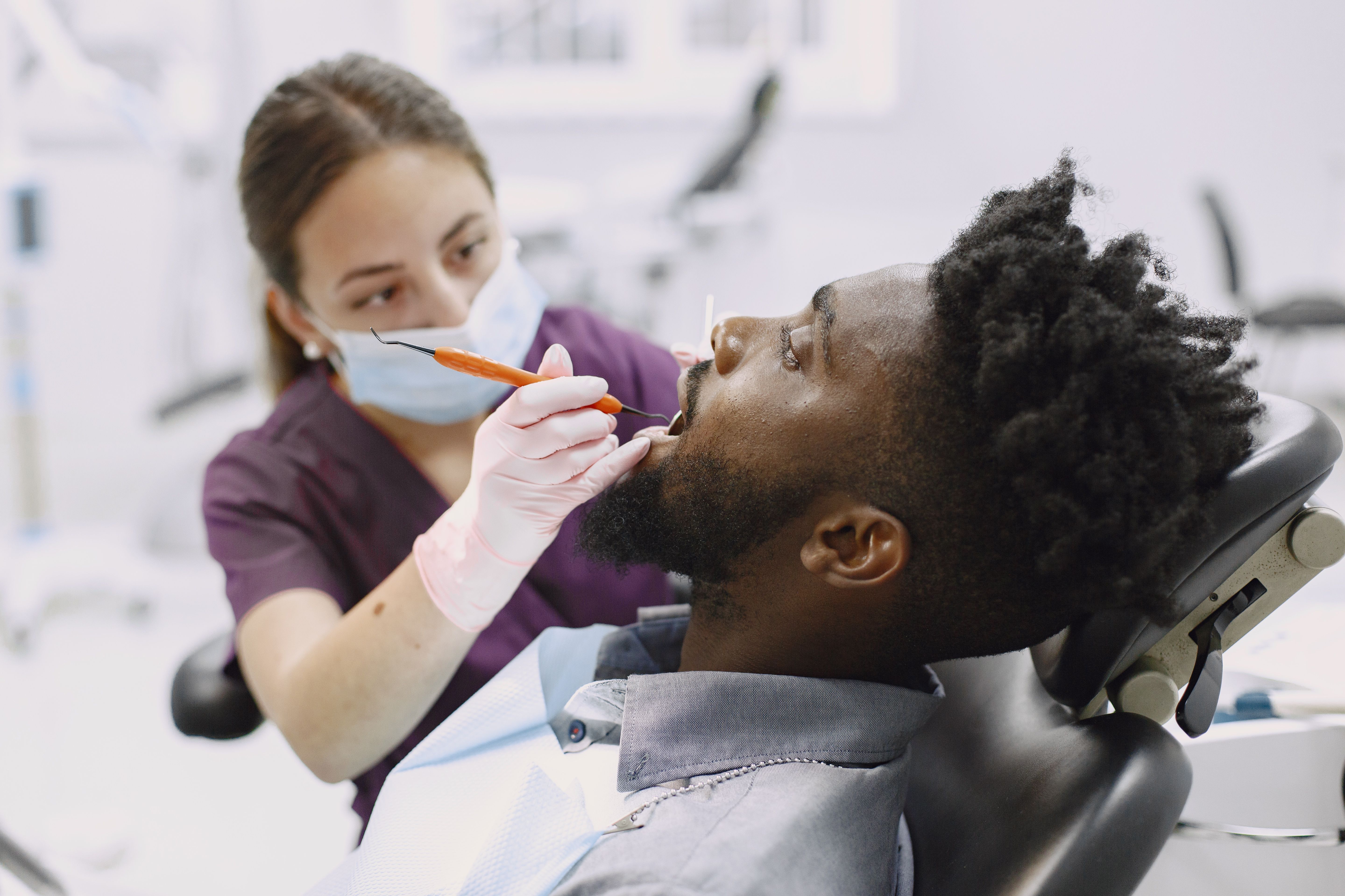 Dentist with a patient